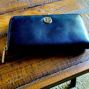 Used Tory Burch wallet please see pics for condition- some wear on hardware